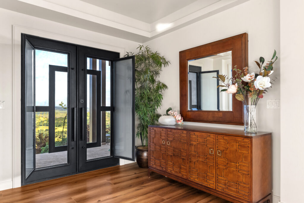 Modern wood front door with glass sidelights on a contemporary home in Butte County